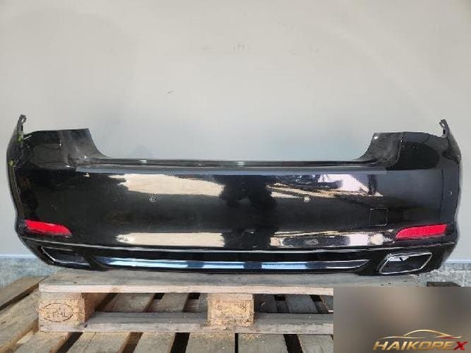 BMW 7 серия 2009 — задний бампер
