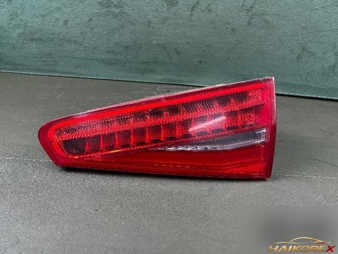 Audi A4 2013 — белая отделка багажника 1