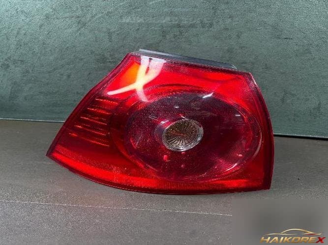 Volkswagen Golf 2008 — фонарь задний левый (комбинированный) 1K6 945 095 AC