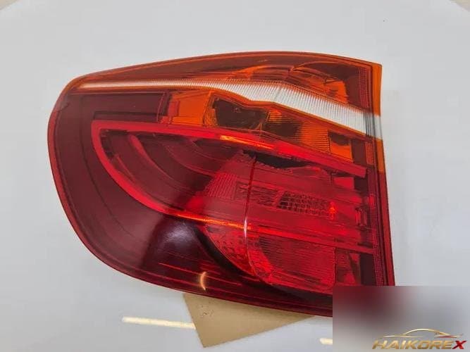 BMW X-серия 2012 — фонарь задний левый (внешний) 7217311