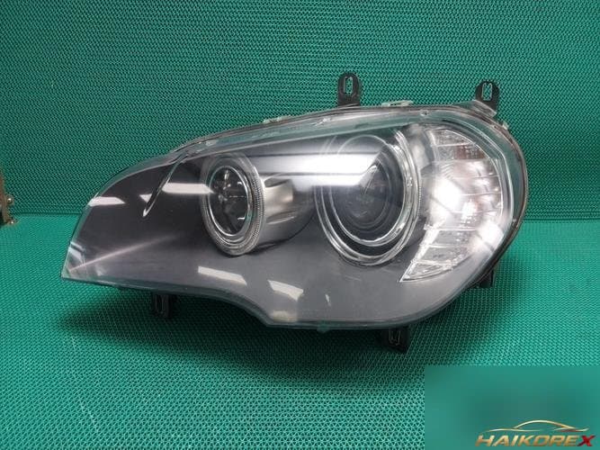 BMW X-series 2007 — фара левая HID 728899102