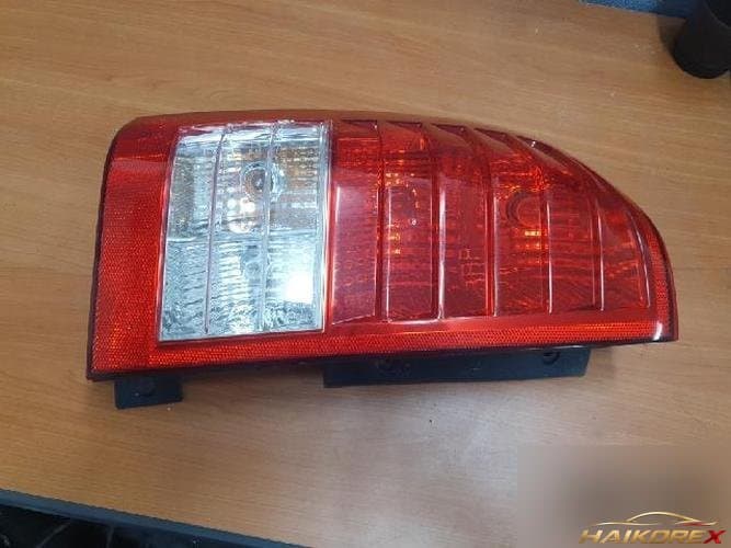 Kia Carnival 2010 — комбинированный фонарь (задний) левый