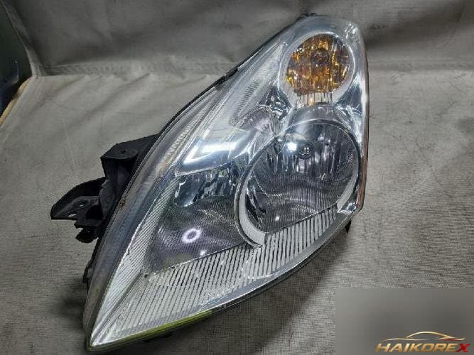 Nissan Altima 2010 — фара головного света левая 26060ZX20B