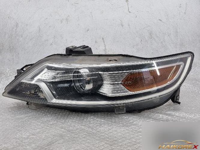 Ford Taurus 2011 — фара левая