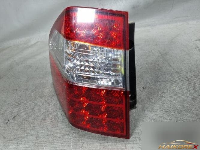 Kia Mohave 2009 — комбинированный задний фонарь левый