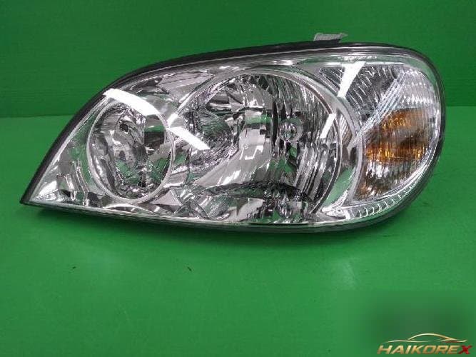 Kia Carnival 2002 — фара левая 0K55351040B
