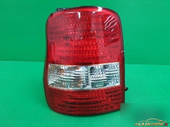 Kia Carnival 2005 — комбинированный фонарь задний левый 1K53A 51160 1