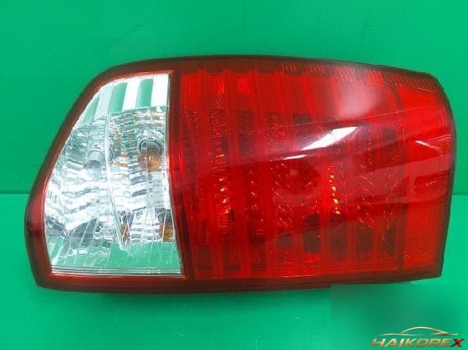 Kia Carnival 2006 — фонарь задний комбинированный правый (пассажирский) 92402 4D000 7