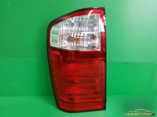 Kia Carnival 2007 — задний комбинированный фонарь левый