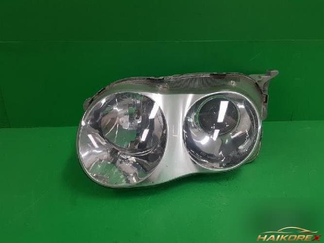 Hyundai Tiburon 2001 — фара левая 9210327510