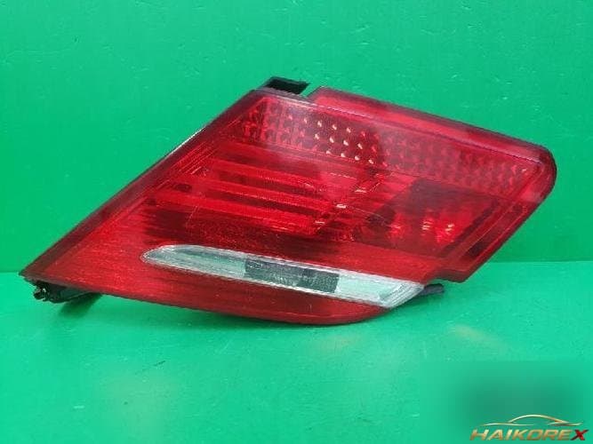 BMW 7 Series 2008 — белая отделка крышки багажника 6938518 1