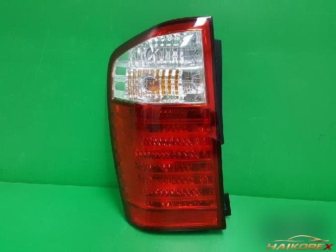 Kia Carnival 2006 — комбинированный задний фонарь левый