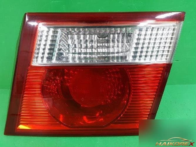 Kia Carens 2003 — белый фонарь багажника 0K2FB51180
