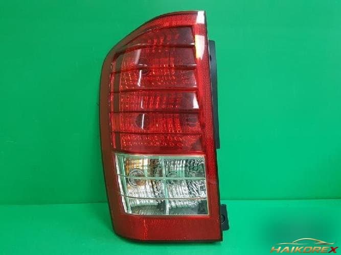 Kia Carnival 2008 — комбинированный задний фонарь левый (водительский)