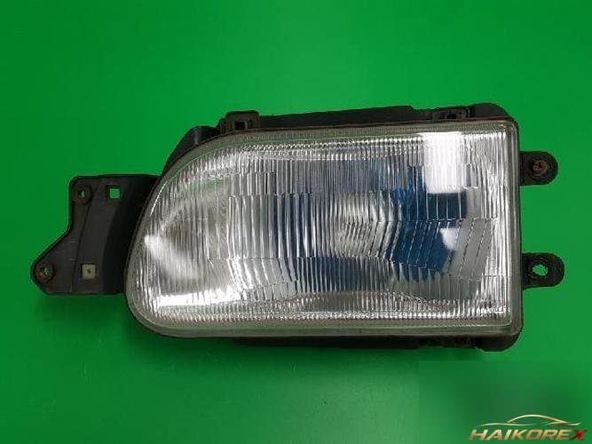 Kia Taurrn 2000 — фара левая AA10051040