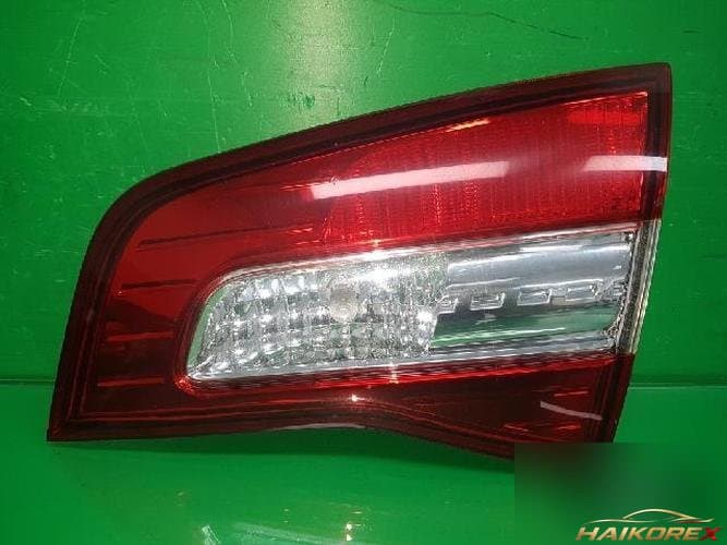 Renault QM5 2009 — накладка крышки багажника (с фонарём) 26550 JY05A 1