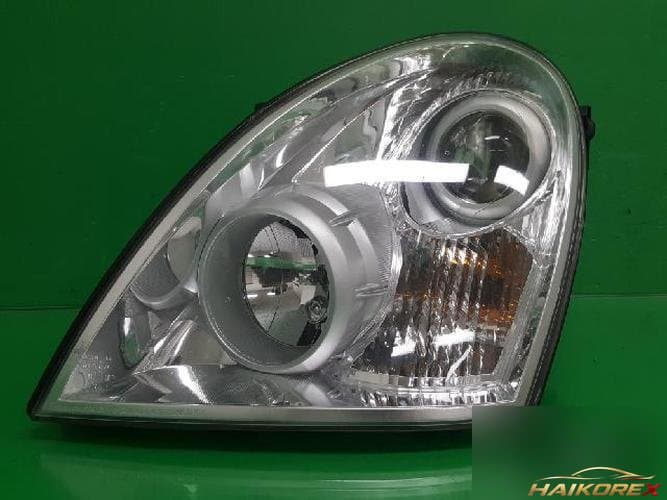 KG Mobility Rexton 2010 — фара левая 8310108B04