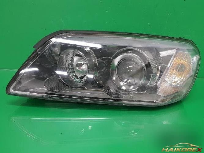 Daewoo Winstorm 2009 — фара левая 00015547