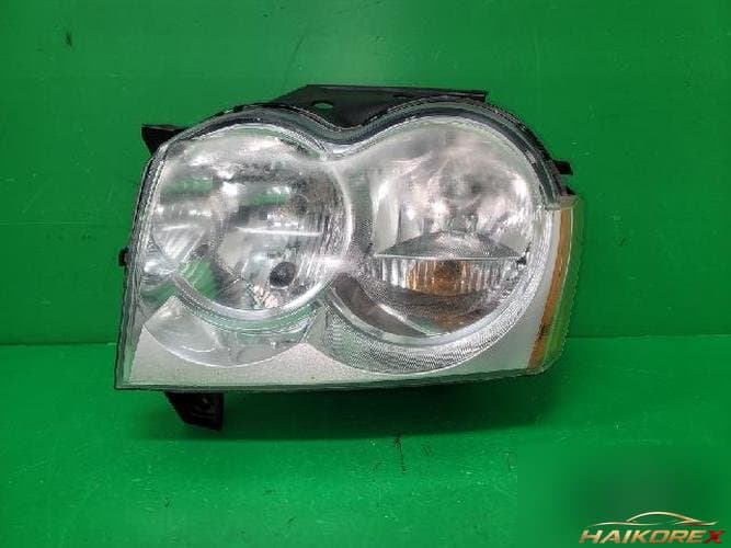 Jeep Grand Cherokee 2005 — фара левая 55156671AG