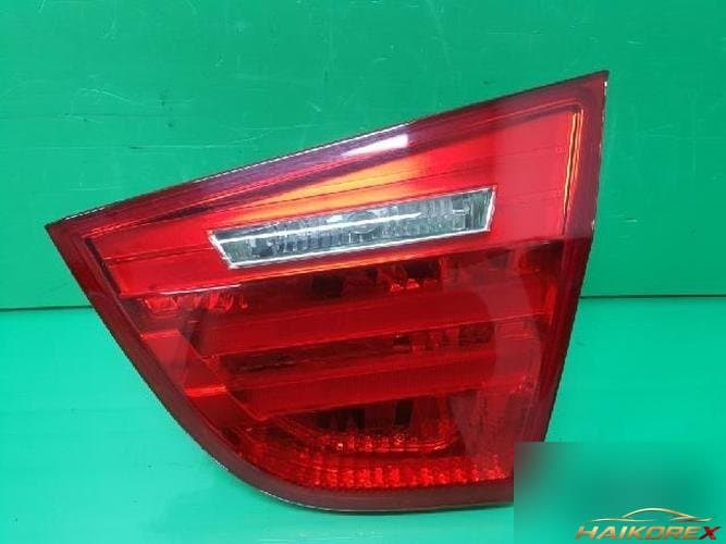 BMW 3 Series 2009 — накладка крышки багажника (с фонарём) 7154156 1