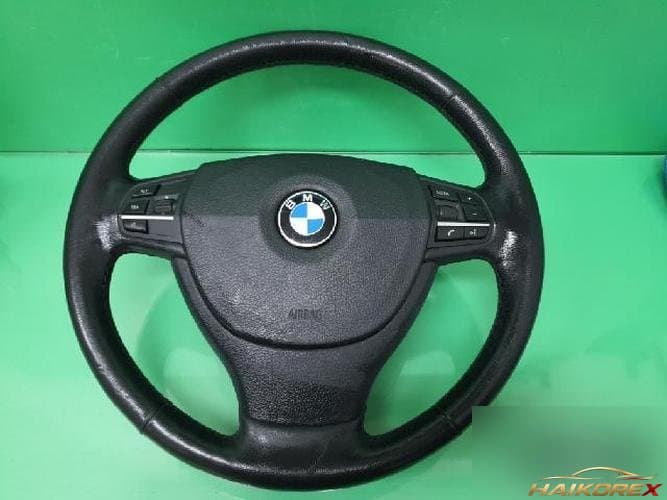 BMW 7 Series 2009 — рулевое колесо 2