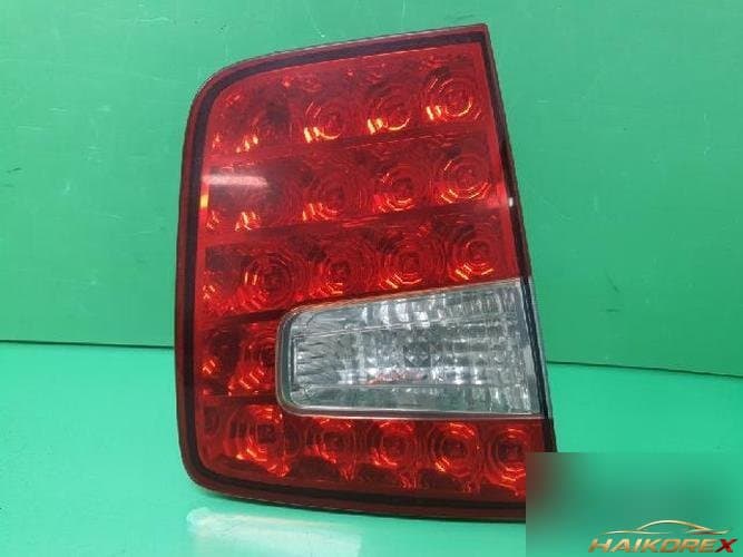 Kia Mohave 2008 — накладка двери багажника левая 92405 2J1