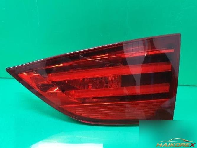 BMW X Series 2010 — накладка крышки багажника (с фонарём) 6321 2990114 05