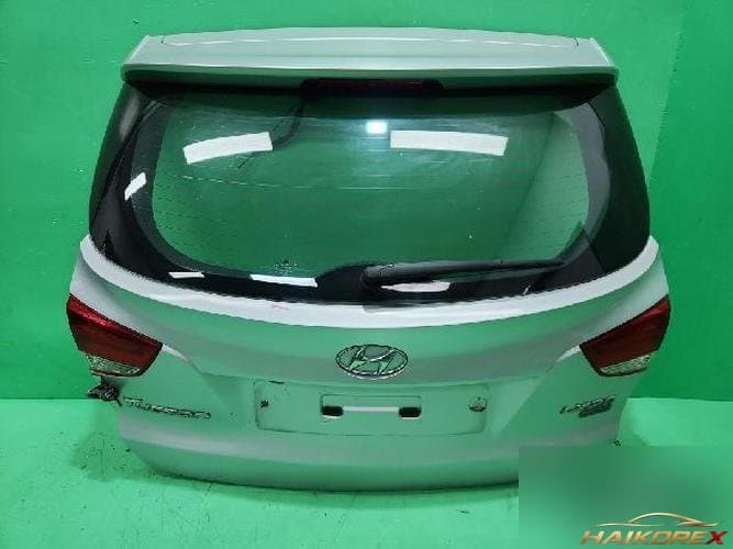 Hyundai Tucson 2011 — крышка багажника серебристая