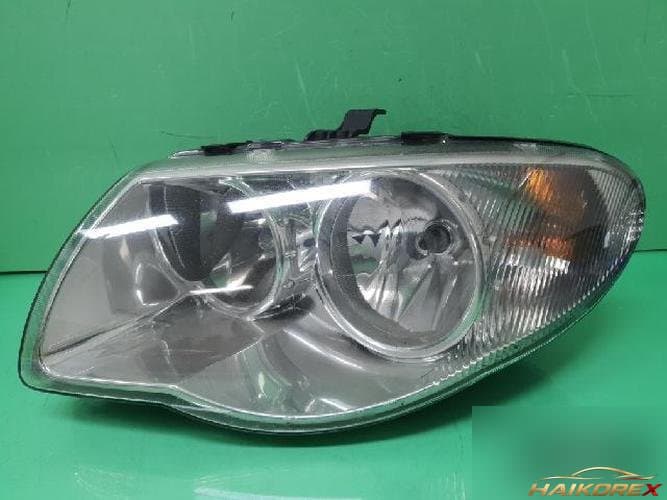 Chrysler Grand Voyager 2007 — фара левая 04857831AC