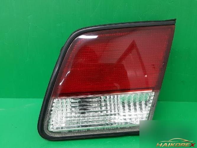Renault SM5 2002 — накладка крышки багажника (с фонарём) 53804 51000