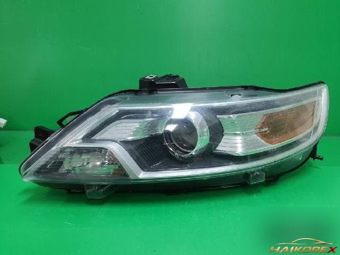 Ford Taurus 2010 — фара левая