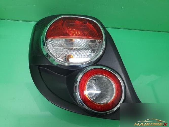 Chevrolet Aveo 2012 — фонарь задний левый (комбинированный) 96831065