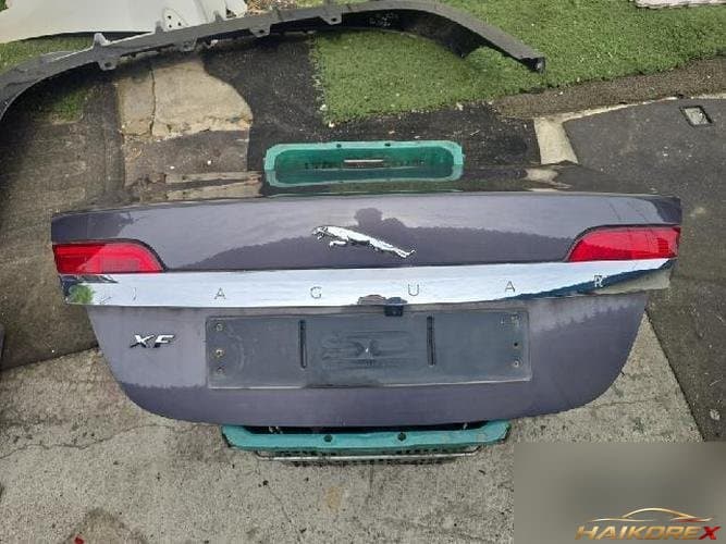 Jaguar XF 2010 — крышка багажника