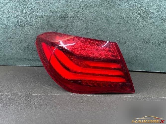 BMW 7-Series 2013 — задний фонарь комбинированный левый (водительский)
