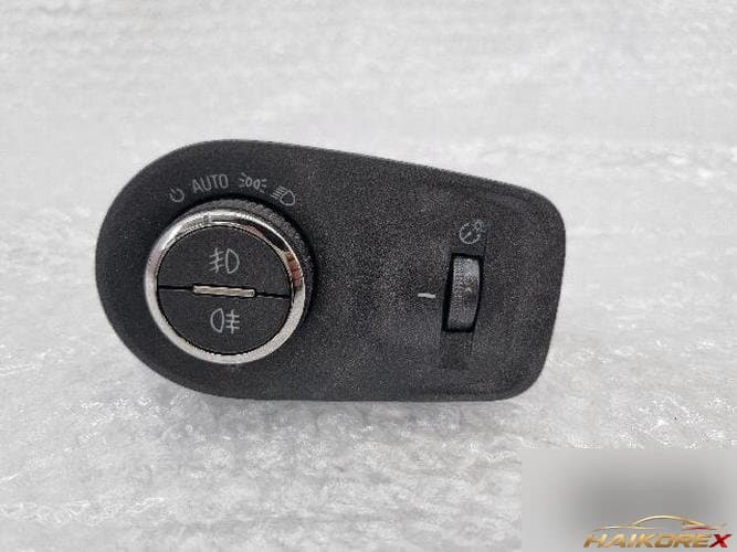 Cadillac SRX 2011 — кнопка регулировки фар 25893082