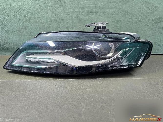 Audi A4 2009 — фара левая HID