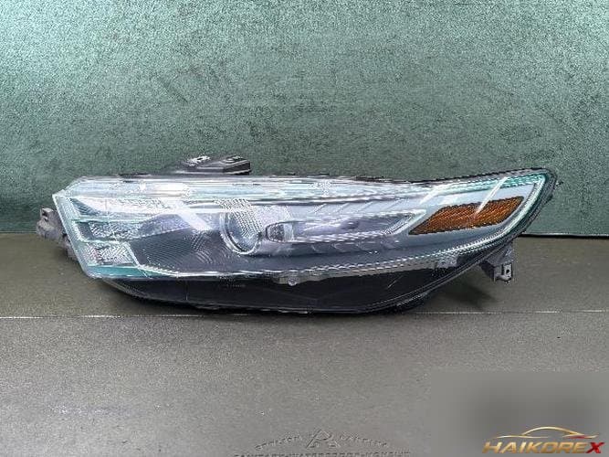 Ford Taurus 2013 — фара левая