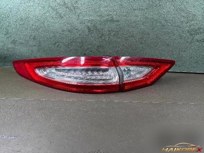 Ford Mondeo 2015 — задний комбинированный фонарь левый (в комплекте с подсветкой багажника) DS73-13404-DH