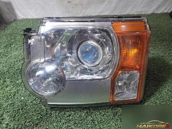 Land Rover Discovery 2007 — фара левая