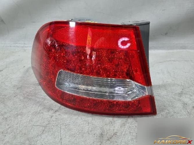 Kia Roche 2009 — комбинированный фонарь задний левый (водительский)