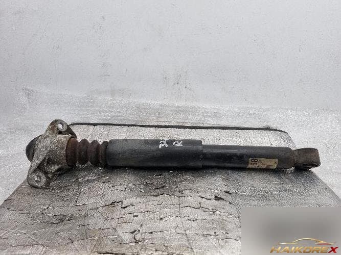 Volkswagen Golf 2012 — амортизатор задний правый 1K0 512 011 QT