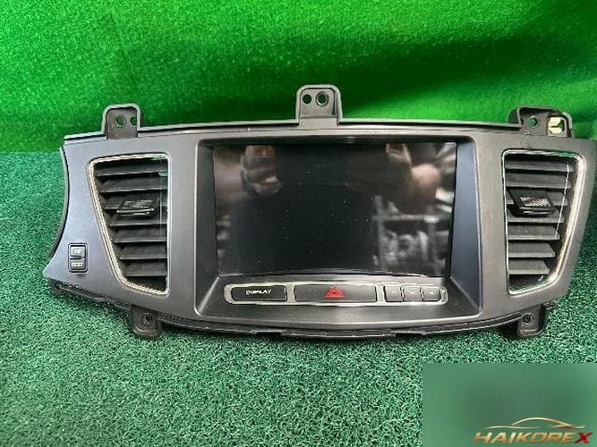 Kia K7 2010 — центральная консоль 1