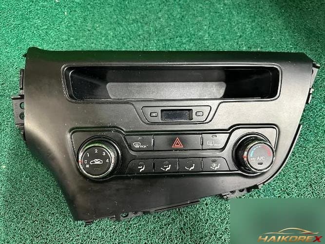 Kia K5 2011 — переключатель управления отоплением/кондиционером 972502T501