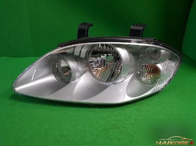 KG Mobility Rodius 2005 — фара левая
