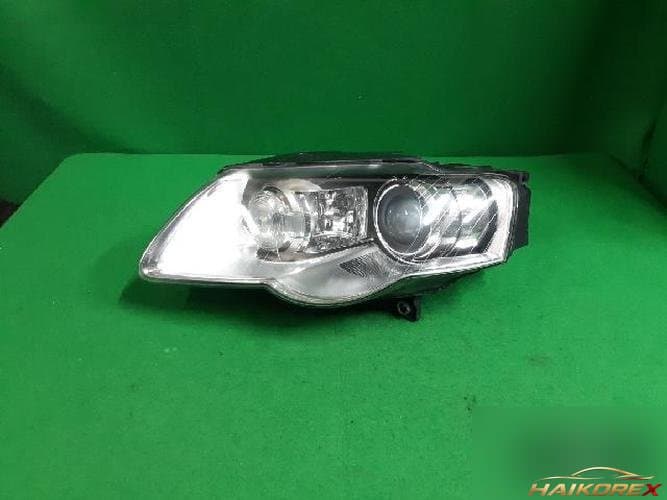 Volkswagen Passat 2009 — фара левая HID