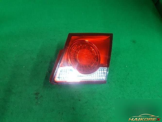 Daewoo Lacetti 2009 — накладка крышки багажника (с фонарём) 2