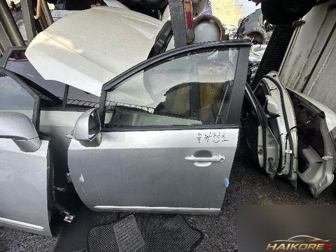 Kia Carens 2010 — передняя дверь левая (2)