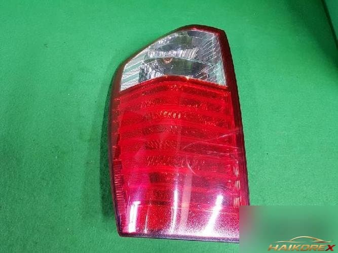 Kia Carnival 2008 — фонарь задний левый комбинированный 92401 4J000 10