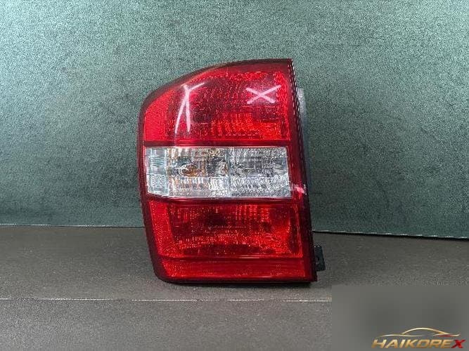 Kia Carnival 2010 — фонарь комбинированный задний левый