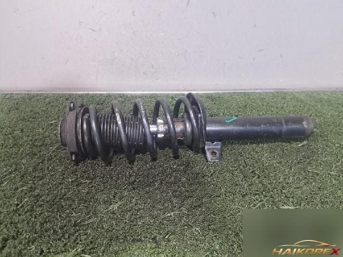 Volkswagen Golf 2008 — амортизатор передний левый 1T0413031FL